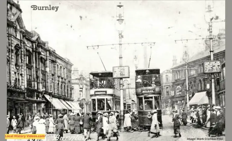 Old photo of trams in Burnley town centre Lancashire England UK