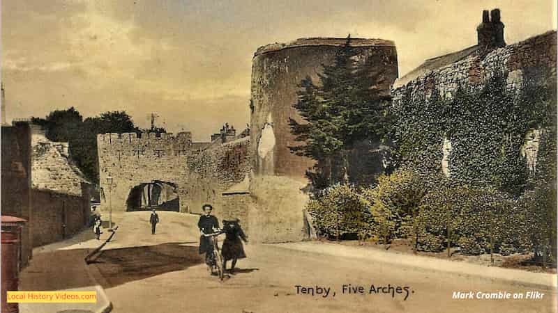 old photo of children playing at Five Arches in Tenby