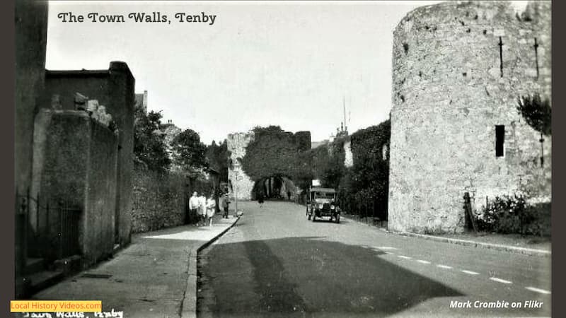 old photo of the town walls and Five arches at Tenby