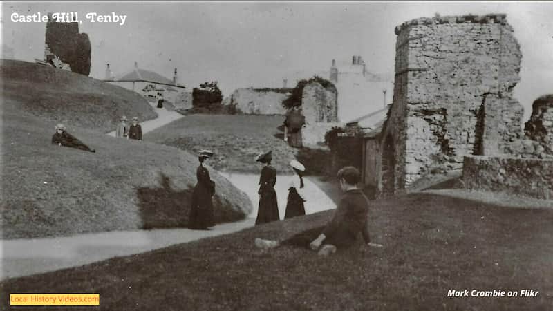 old photo of visitors at Tenby Castle