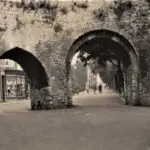 old postcard of the Five Arches in Tenby