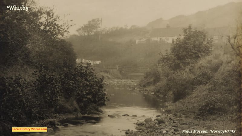 Old photo of a cottage and stream on the outskirts of Whitby Yorkshire England