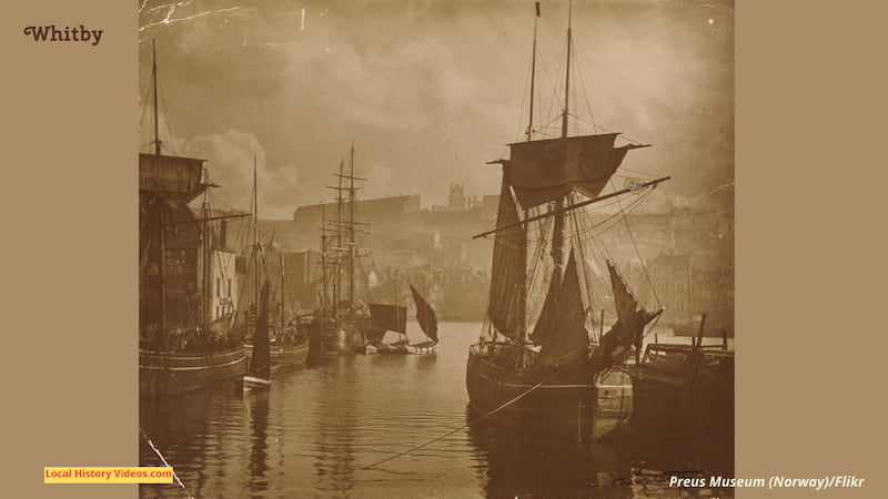 Old photo of Whitby Harbour with old fishing ships
