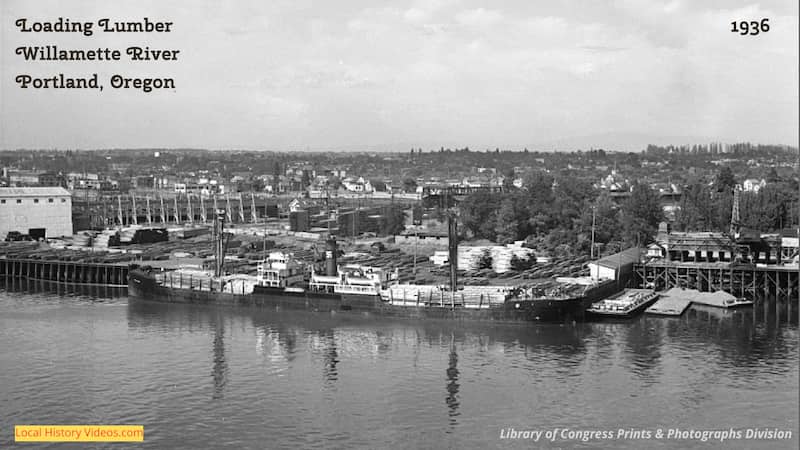 old photo of lumber loaded onto boats at the Willamette River, Portland Oregon, 1936