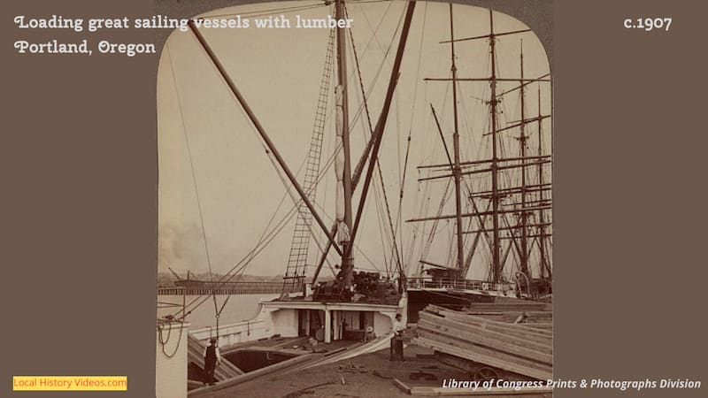Old photo of lumber being loaded onto sailing vessels Portland Oregon c.1907