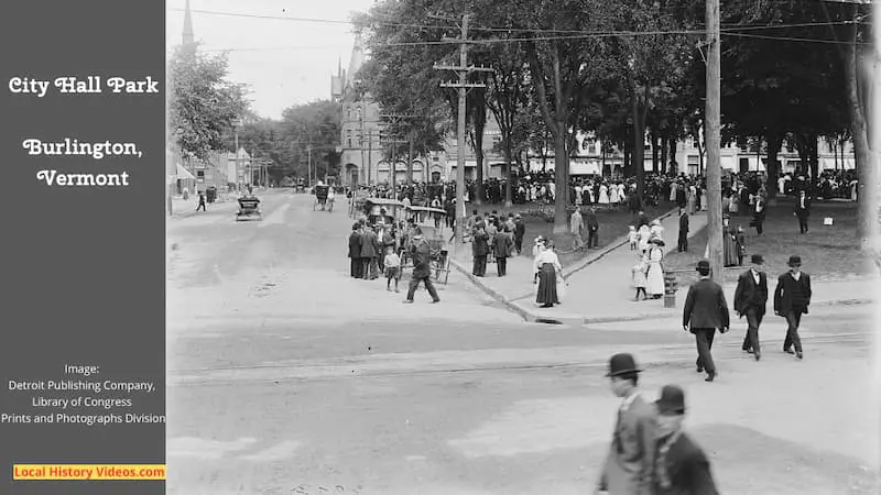 An old photo of crowds gathered at the City Hall Park in Burlington, Vermont