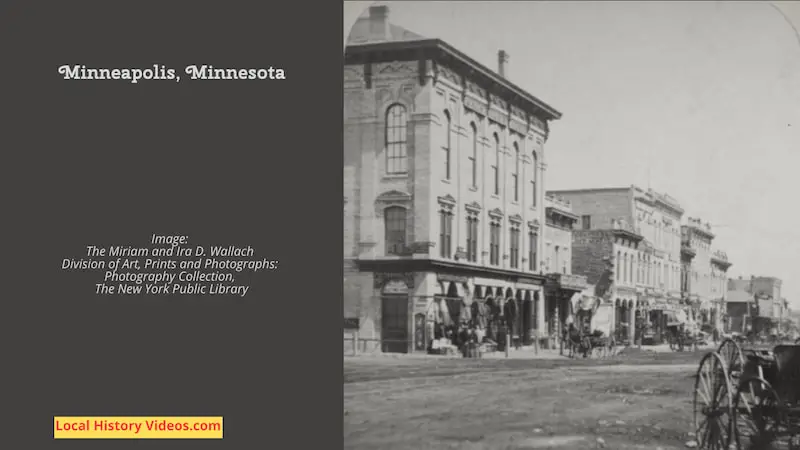 Old photo of horses and carts in a Minneapolis commercial street