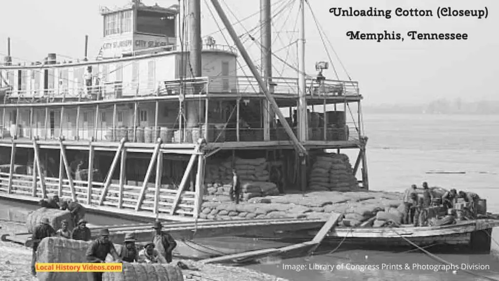 Closeup of an old photo of men unloading cotton at Memphis, Tennessee, probably taken in the early years of the 20th Century