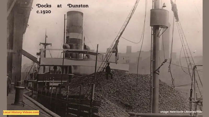 Old photo of a loaded ship (probably with coke) at the Dunston docks, taken around 1920