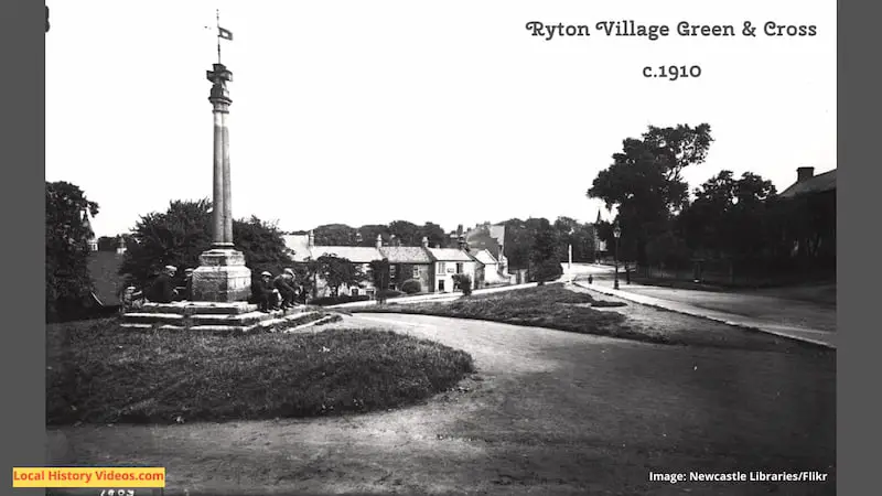 Old photo of the village green and cross at Ryton, taken around 1910