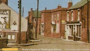 Closeup of an old postcard of Brady's Square at Washington Station, showing beyond the level crossing