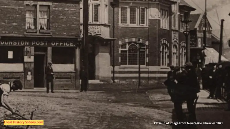 Closeup of an old photo of road works outside the Dunston Post Office and New Club