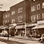 Old photo postcard of the High Street Chigwell Essex in the 1960s