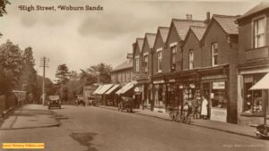 Old photo postcard of High Street Woburn Sands Buckinghamshire