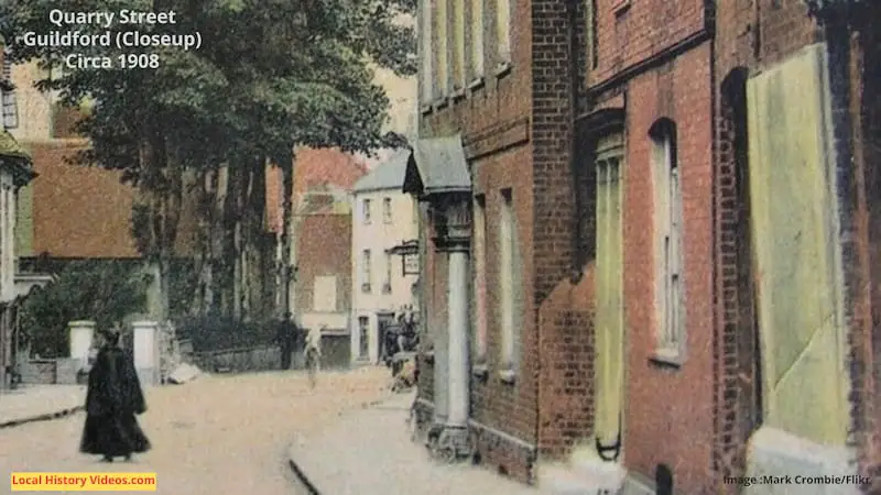 Closeup 2 of an old photo postcard of Quarry Street Guildford Surrey England 1908
