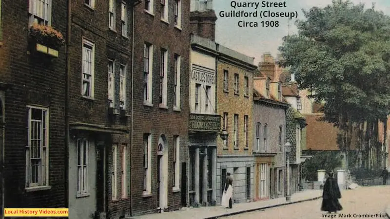 Closeup of an old photo postcard of Quarry Street, Guildford, posted in 1908