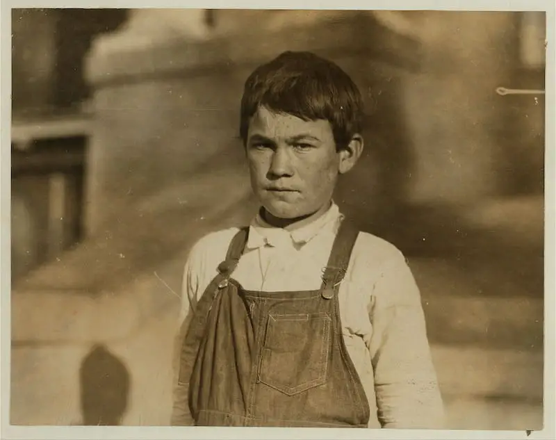 Old photo of 14 year old Henry, a child beet worker at Fort Collins, taken in 1915