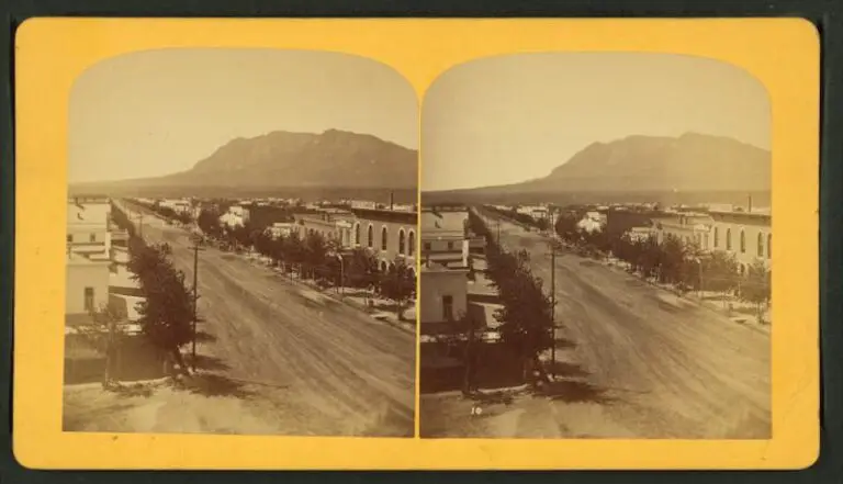 Old image of Tejon Street, Colorado Springs, Colorado, looking south, with Cheyenne Mountain in the distance