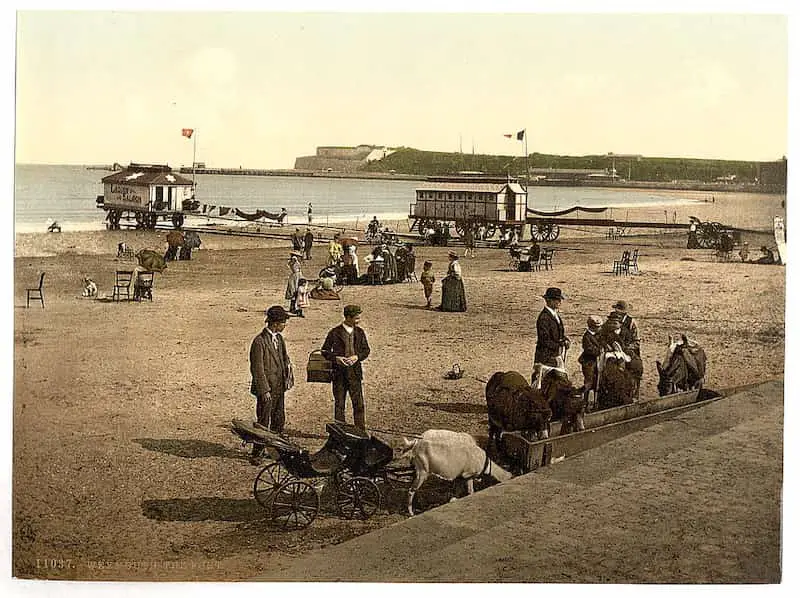 Old photo of the beach at Weymouth, with Nothe Fort beyond, in Dorset, England, in the 1890s
