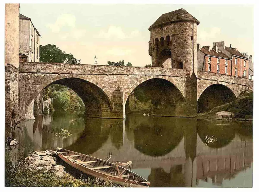 Old photo of the bridge over the River Monnow at Monmouth in Wales, in the 1890s