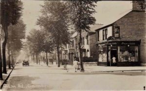 Old photo postcard of F Cousins Grocery Store on Cam Road, Cambridge, England, circa 1945