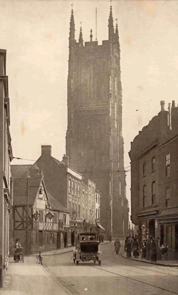 Old photo postcard of Queen Street, Derby, England, circa 1915, with All Saints Church in the background