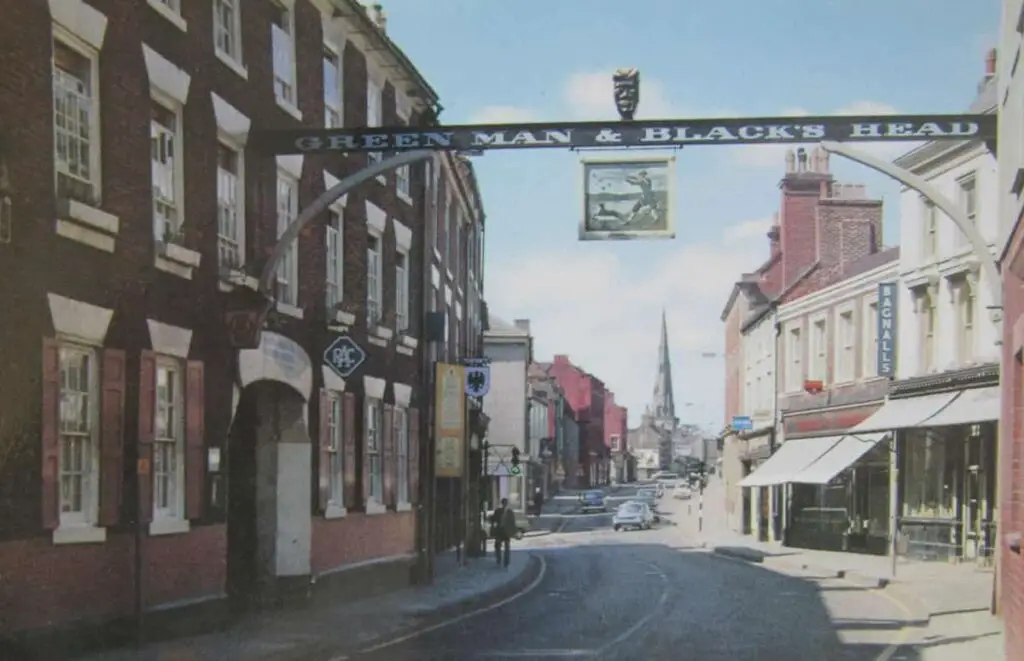 Old photo postcard of the Green Man and Black's Head in Ashbourne, Derbyshire, England