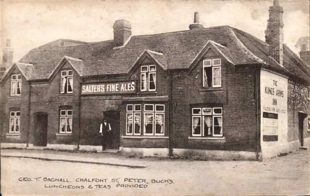 Old photo postcard of the Kings Arms Inn at Chalfont St Peter in Buckinghamshire, England, circa 1908. Writing on the front of the photo states "GEO. T. BAGNALL. CHALFONT ST PETER, BUCKS, LUNCHEON & TEAS PROVIDED".