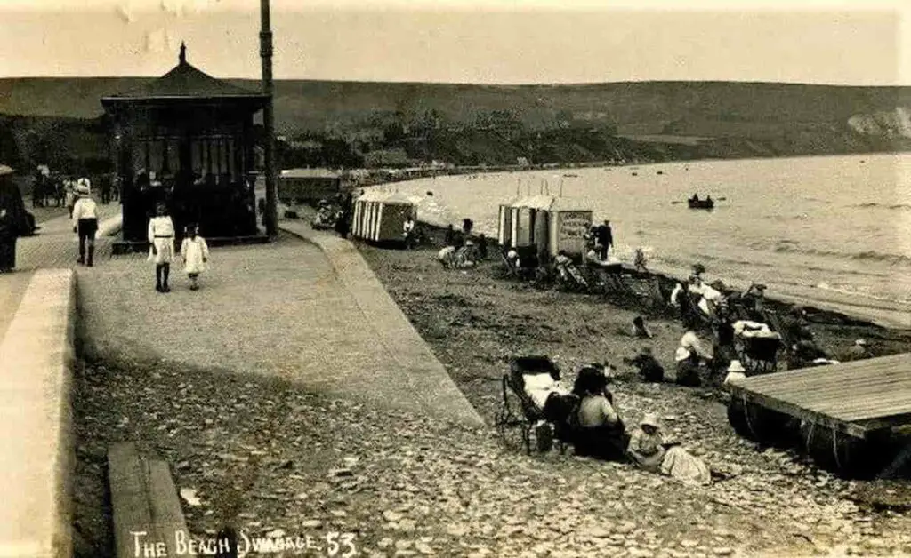 Old photo postcard of the beach at Swanage, Dorset, England, circa 1913