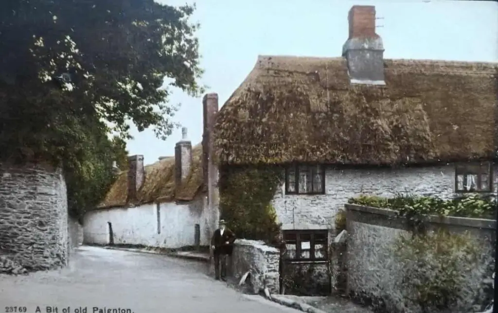 Vintage postcard of old houses in Paignton, Devon, circa 1910
