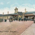 Vintage postcard of the entrance to Northwich Railway Station in Cheshire