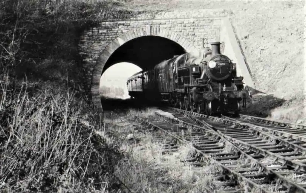 Vintage postcard of the last day of the Portland Special train travelling through the Rodwell tunnel in Dorset, England, in 1965
