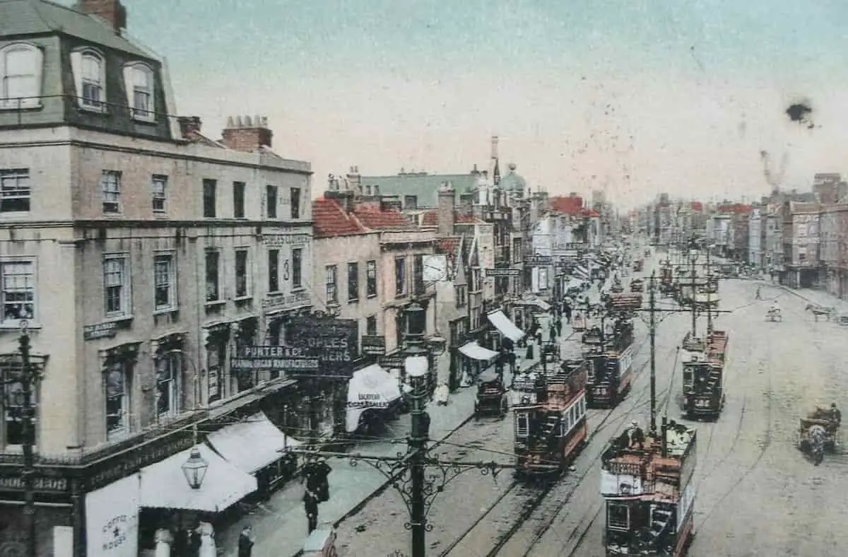 Vintage postcard showing many trams on Old Market Street in Bristol, England, circa 1906