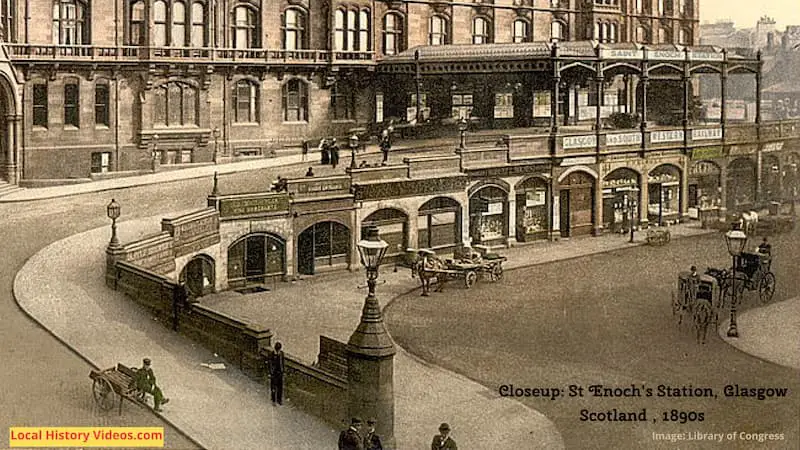 Closeup of an old photo of St Enoch's Station in Glasgow, Scotland, in the 1890s, focusing on the shops