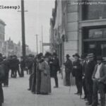 Closeup of old photo of Boise Streets, Idaho, taken around 1907, showing people standing near camera