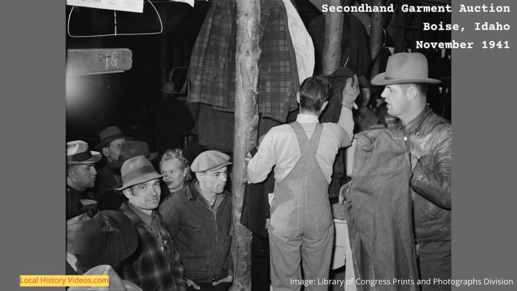 Old photo of a secondhand garment auction in Boise, Idaho, in November 1941