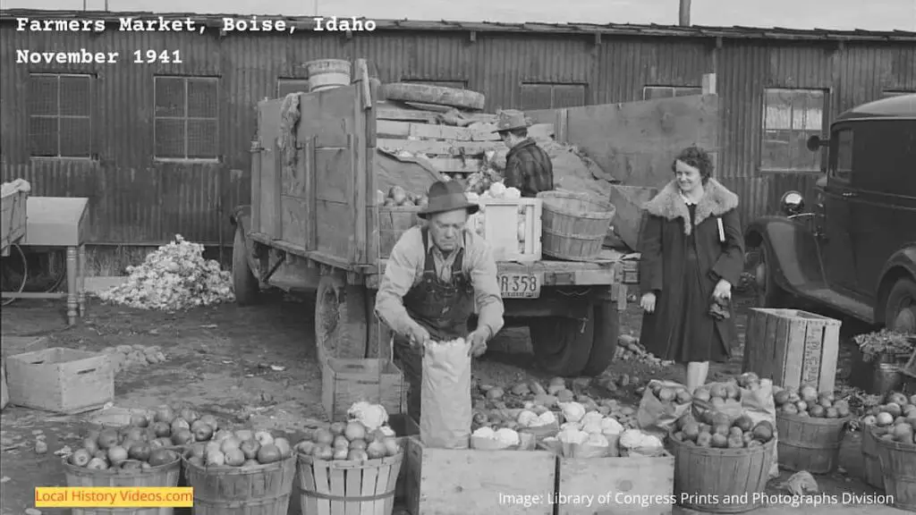 Old photo of apple sellers at the Boise Farmers Market, Idaho, November 1941