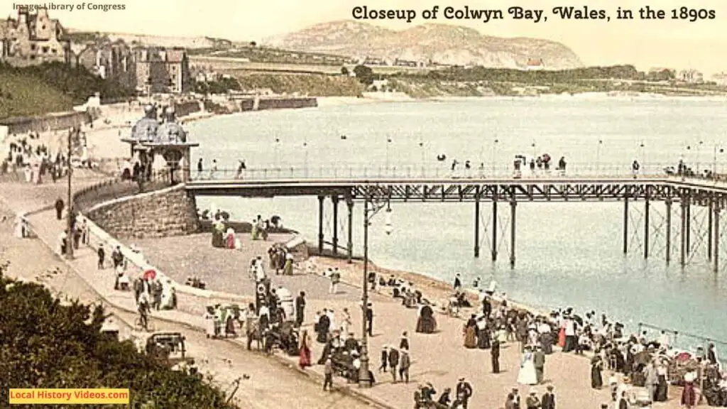 Closeup of an old photo of the beach and pier at Colwyn Bay, Wales, in the 1890s