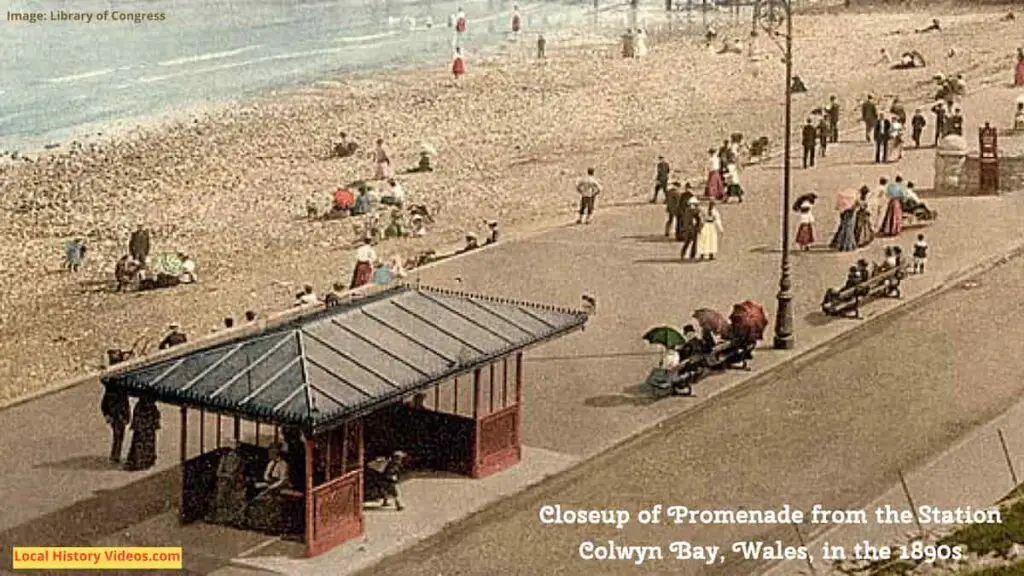 Closeup of the beach in an old photo of the promenade from the railway station in Colwyn Bay, Wales, taken in the 1890s
