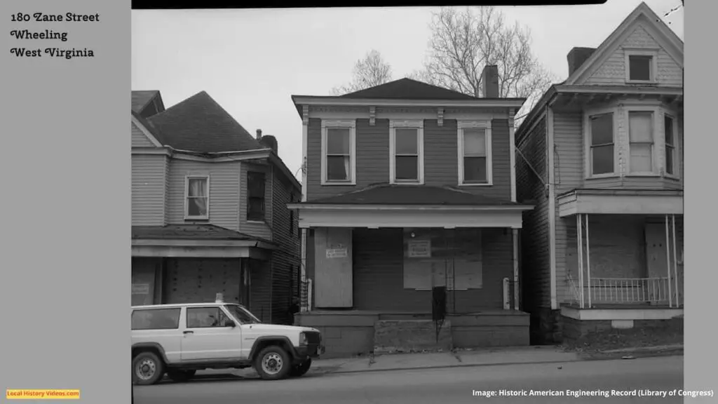 Old photo of the boarded up house at 180 Zane Street, Wheeling, West Virginia