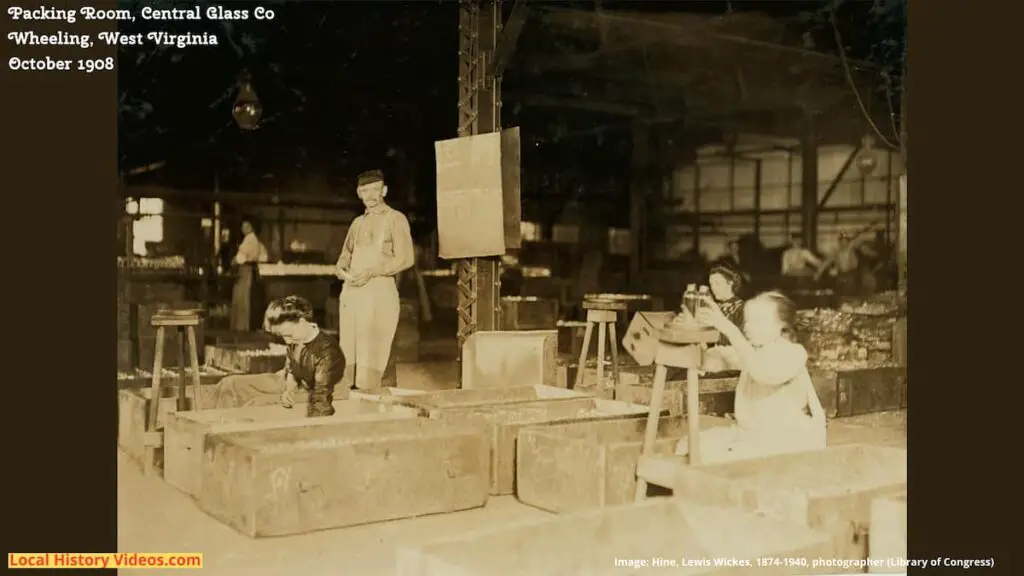 Old photo of women and girls at work under male supervision in the packing room of the Central Glass Company, Wheeling, West Virginia, October 1908