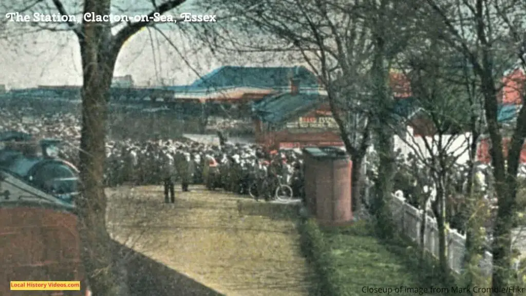 Closeup of an old photo postcard of the crowded railway station at Clacton-on-Sea, Essex, probably in the WW1 era