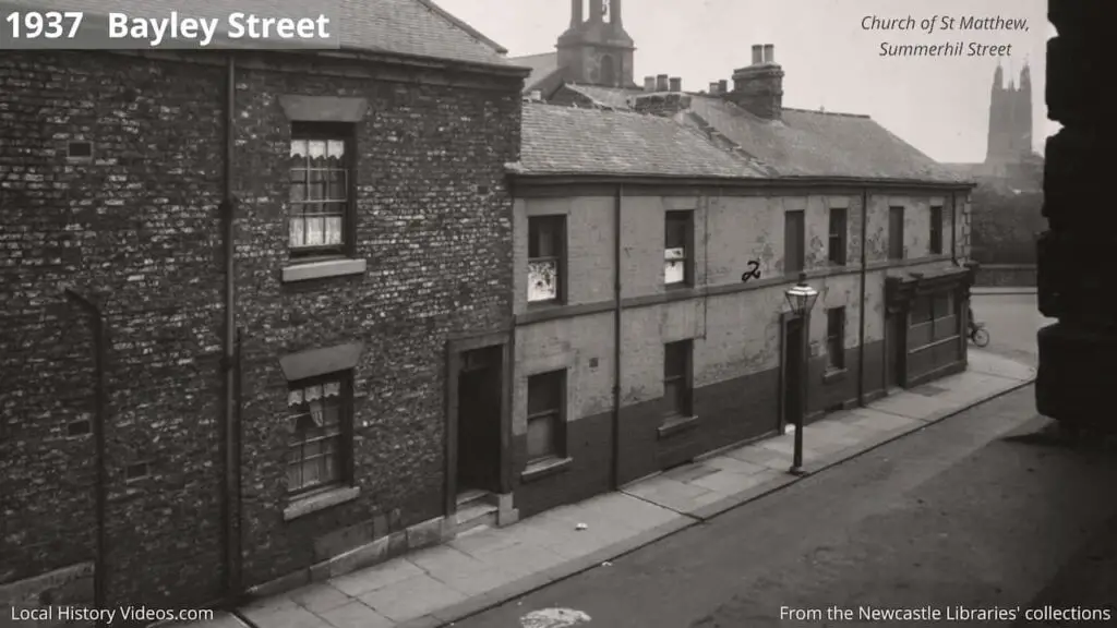 1937 photo of condemned houses at Bayley Street, Fenham, Newcastle upon Tyne, with Sumemerhill Square in the background