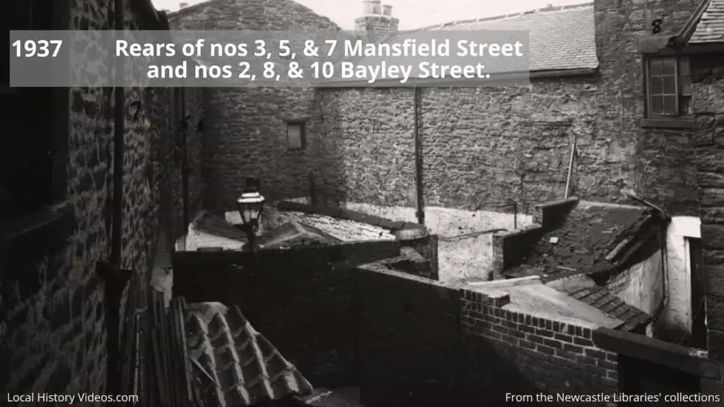 1937 photo of the rear of condemned houses at 3, 5 & 7 Mansfield Street, and 2, 8 & 10 Bayley Street, Fenham, Newcastle upon Tyne