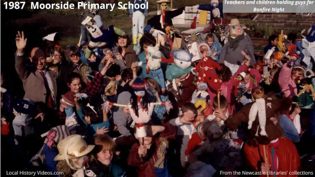 1987 photo of teachers and children at Moorside Primary School. Newcastle upon Tyne, holding up guys for Bonfire Night