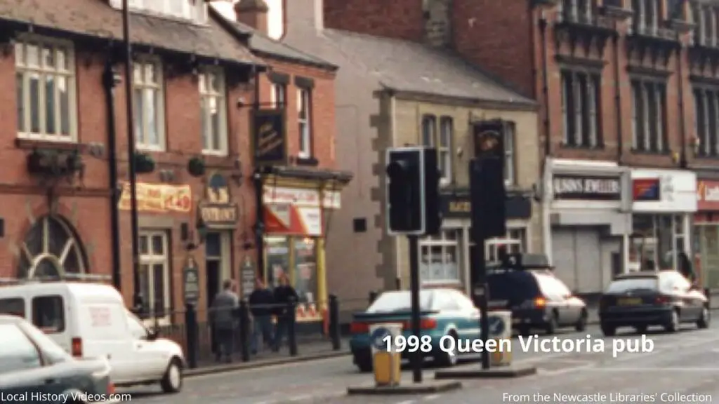 Closeup of a 1998 photo of the Queen Victoria pub and nearby shops, Gosforth High Street, Newcastle upon Tyne