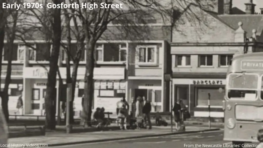 Closeup of an old photo of Gosforth High Street in the 1970s,including Barclays Bank