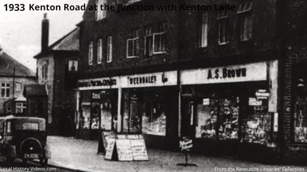 Closeup of the shops in a 1933 photo of Kenton Road at the junction with Kenton Lane