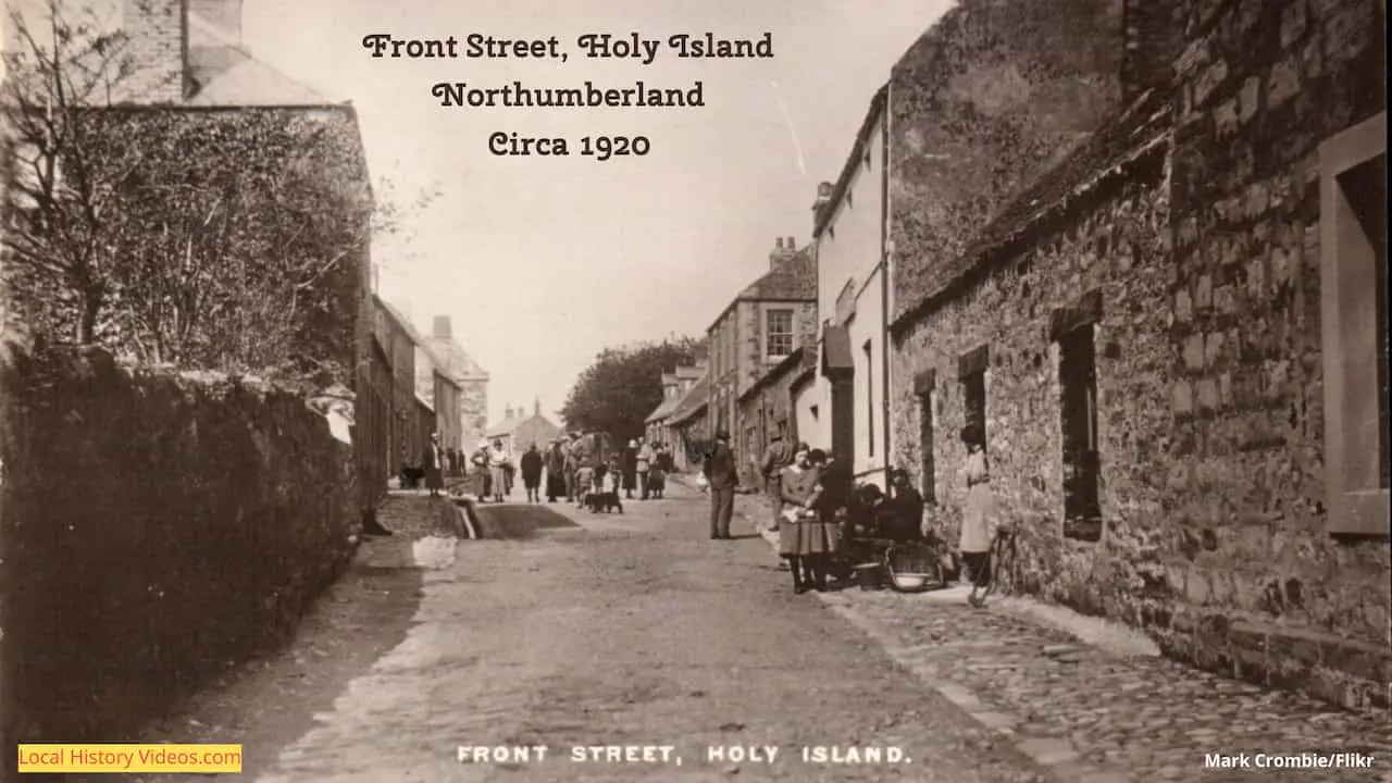 Old photo postcard of Front Street in Holy Island, Northumberland, England, circa 1920