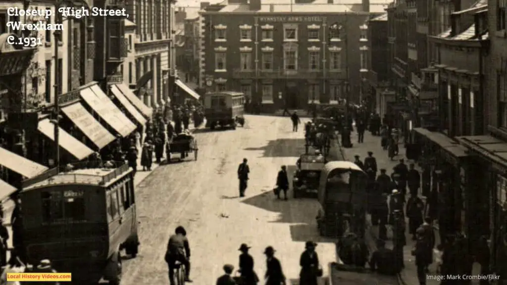 Closeup of the central section of an old photo postcard of the High Street, Wrexham, Wales, 1931